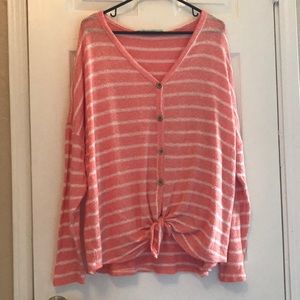 pink and white stripped knotted sweater
